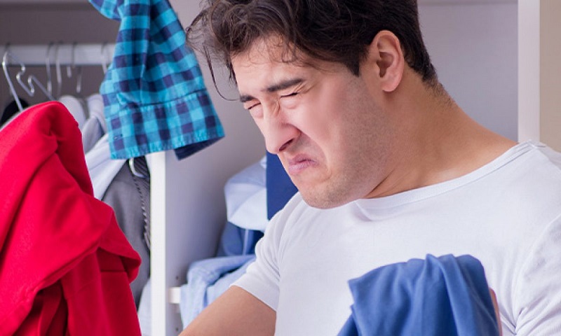 Why does mildew smell out of clothes?